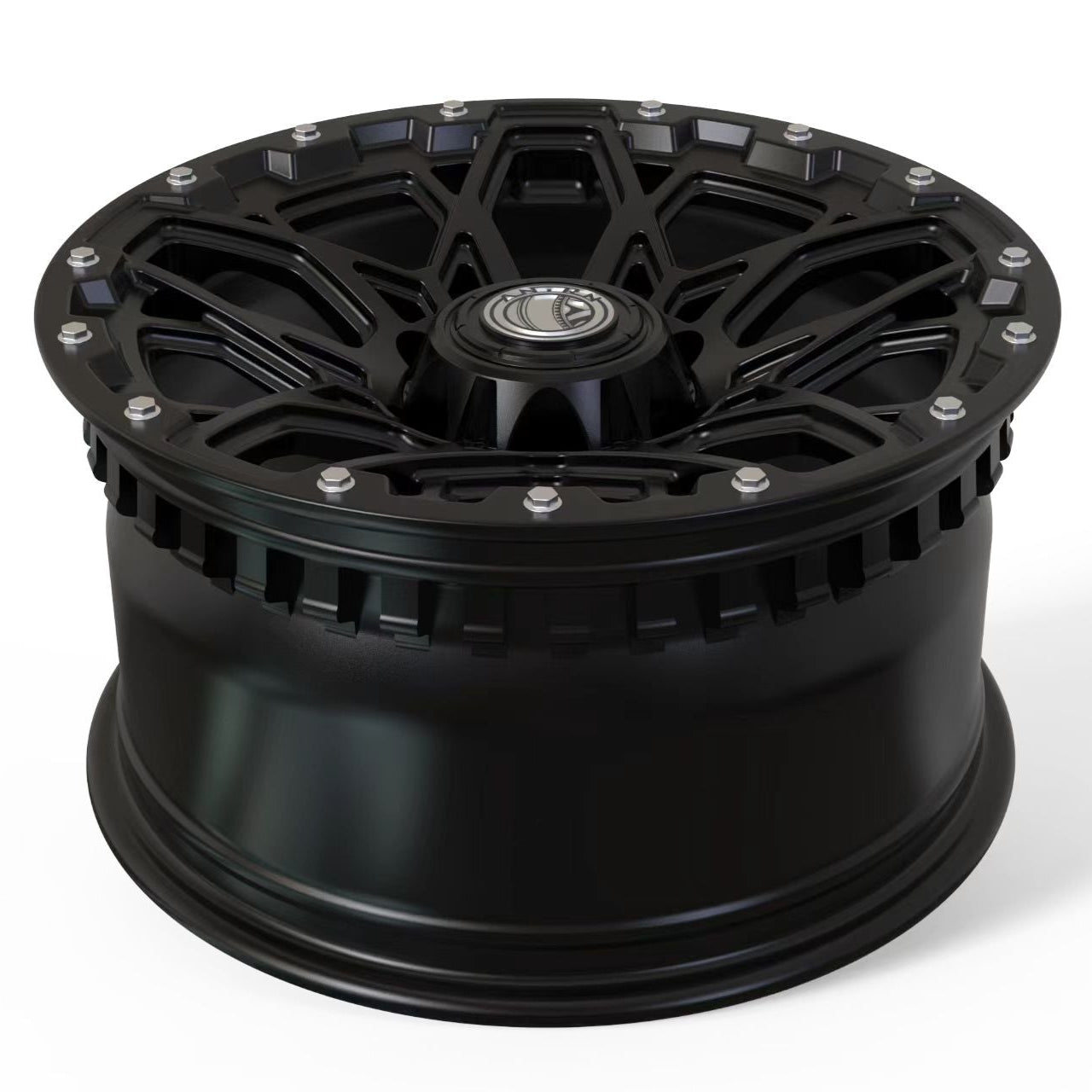 Black alloy wheel on a white background