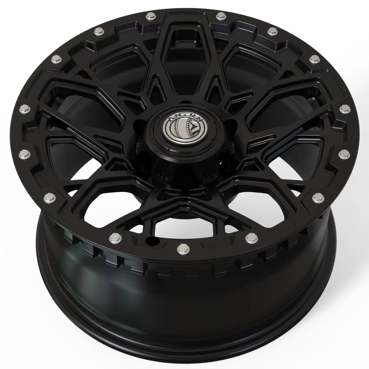 Black alloy wheel on a white background