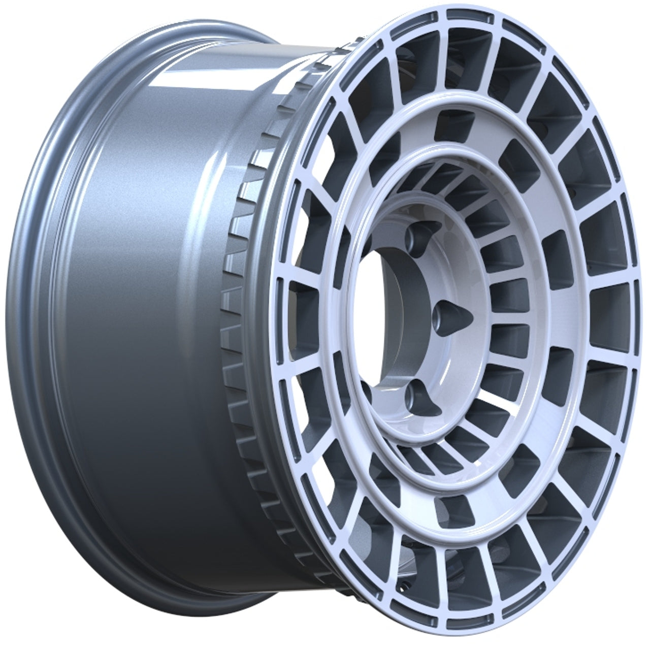 Close-up of a metallic alloy wheel rim on a white background