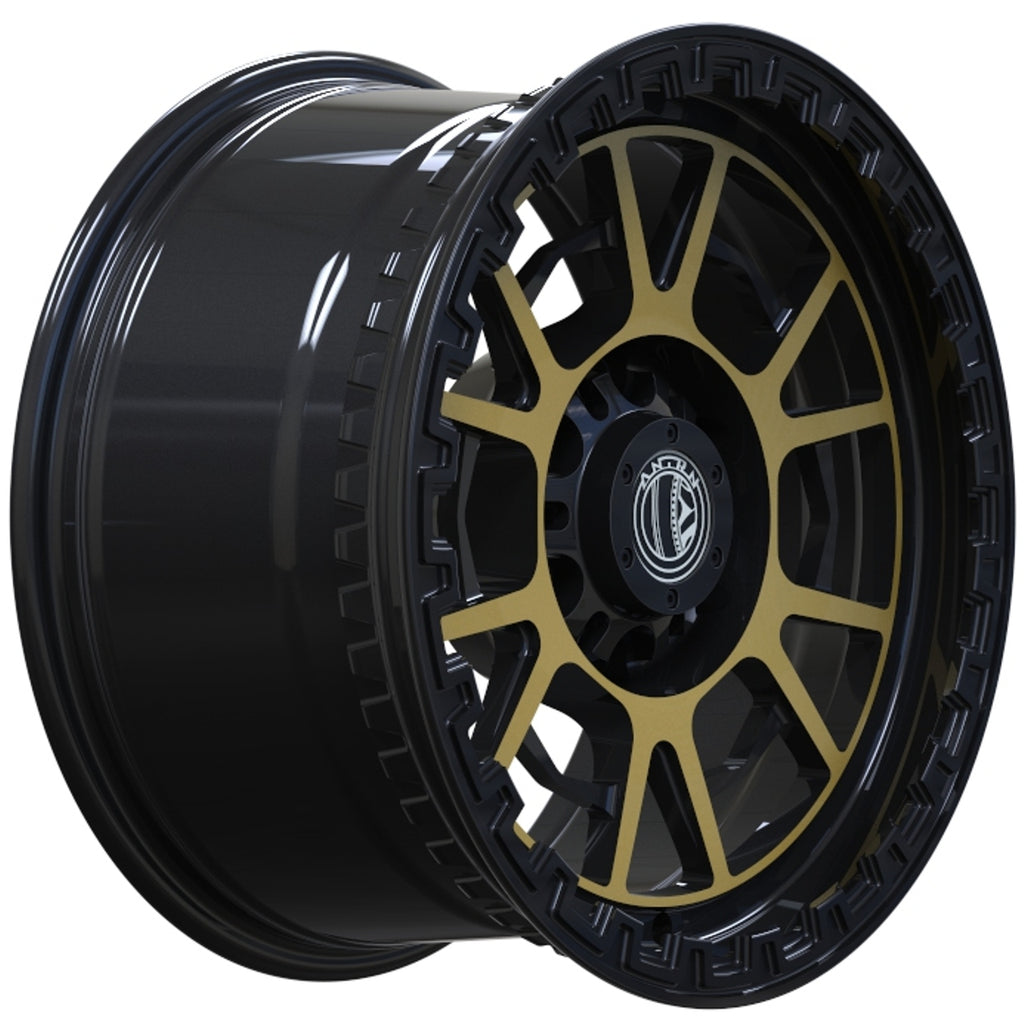 Black alloy wheel with gold accents on a white background