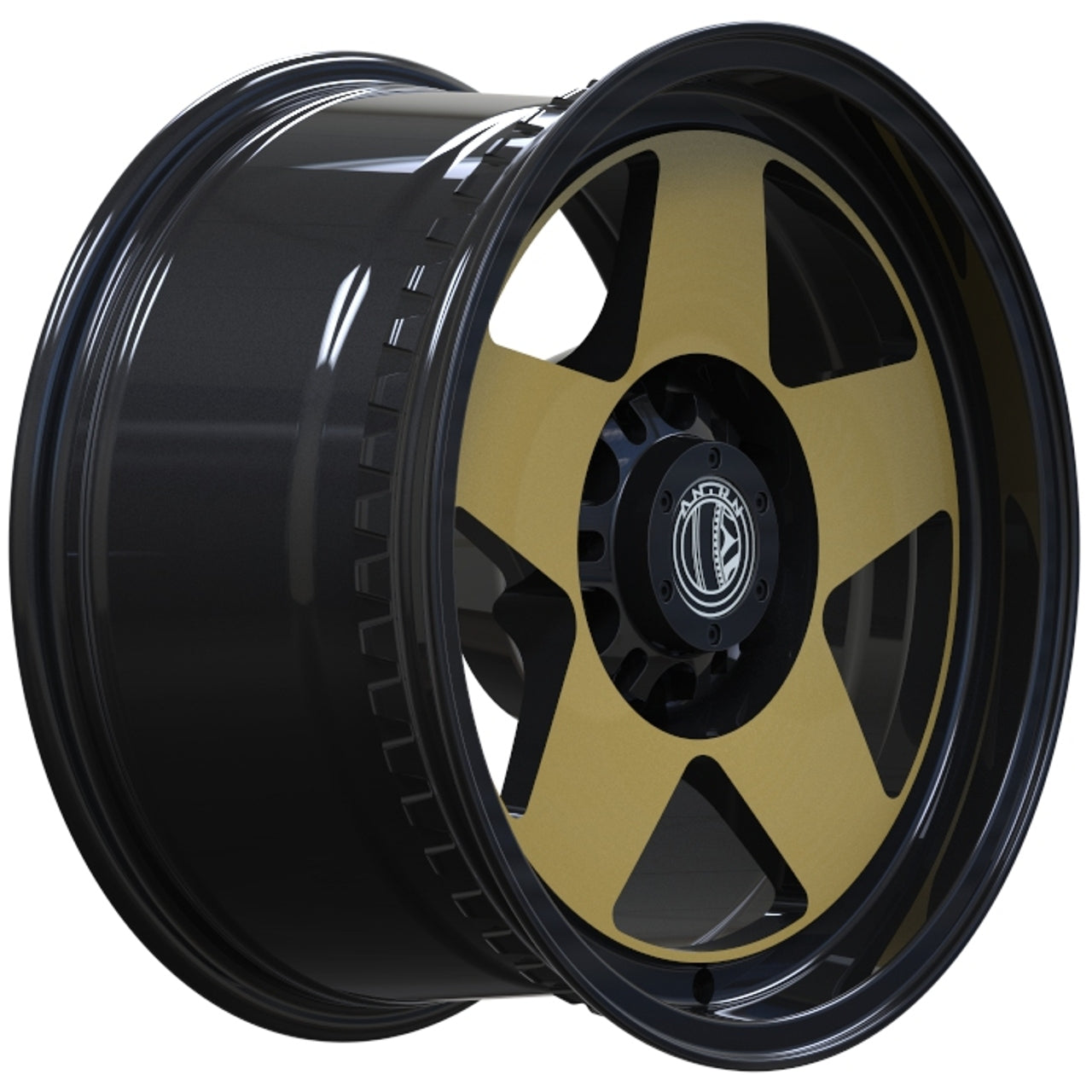 Black and gold alloy wheel on a white background
