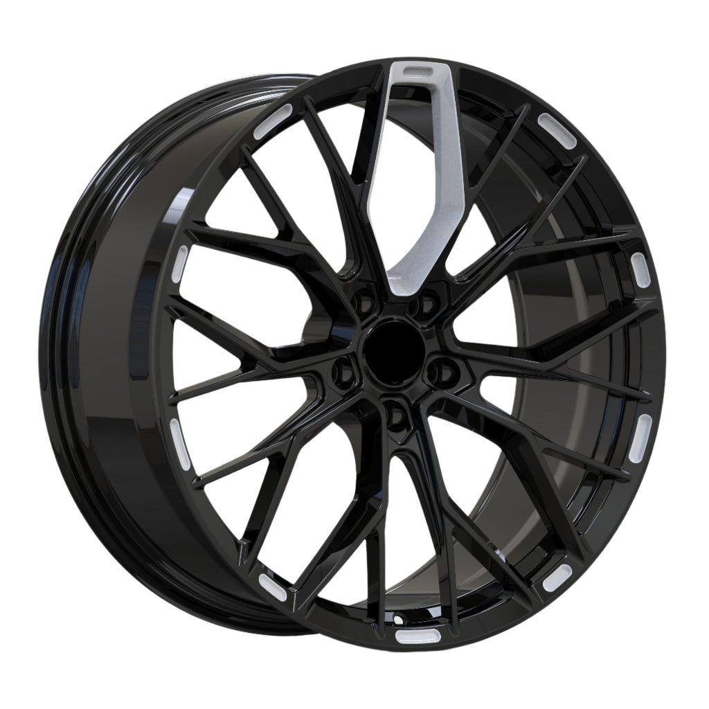 Black alloy wheel on a white background