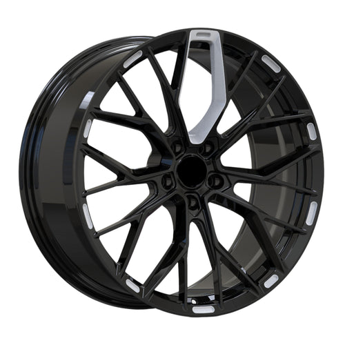 Black alloy wheel on a white background