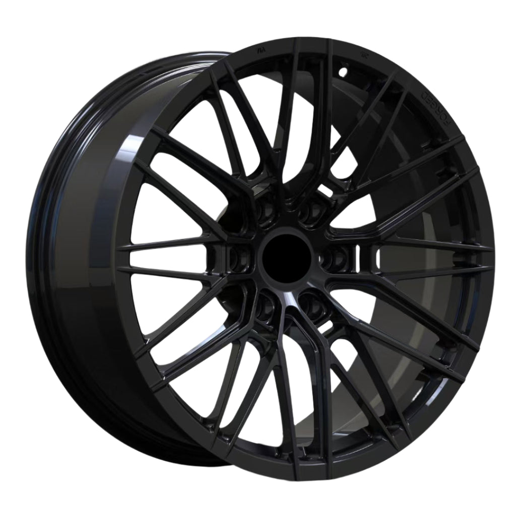 Black alloy wheel on a white background