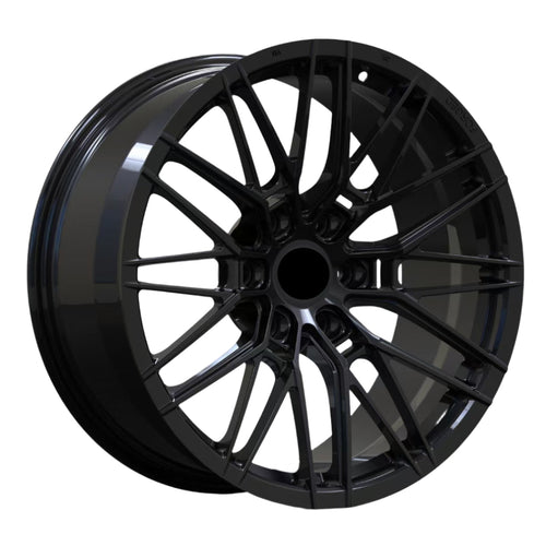 Black alloy wheel on a white background