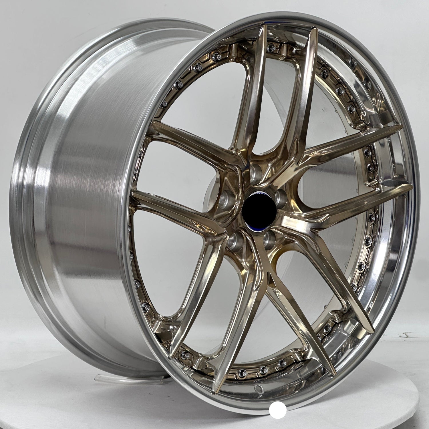 Chrome car wheel rim on a white background