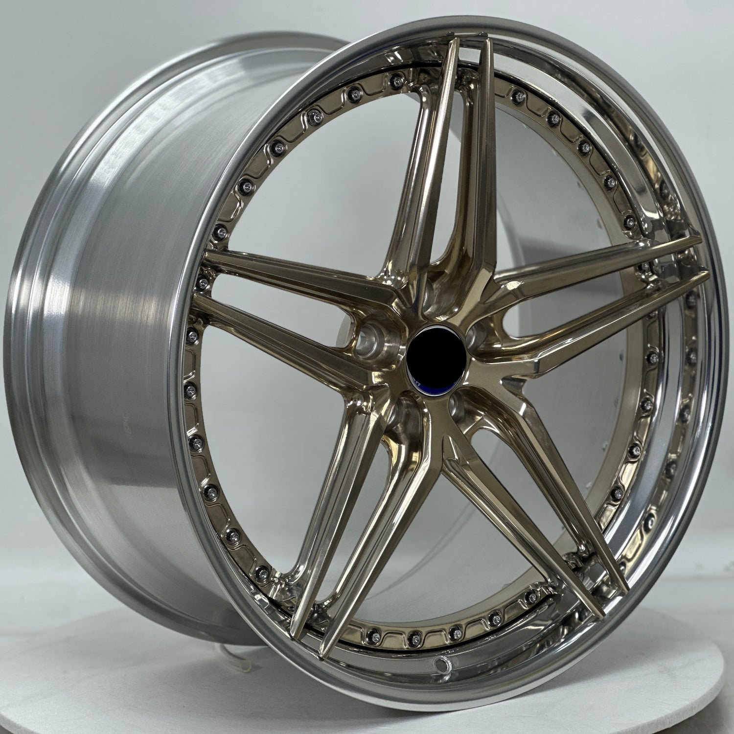 Chrome car wheel rim on a white background