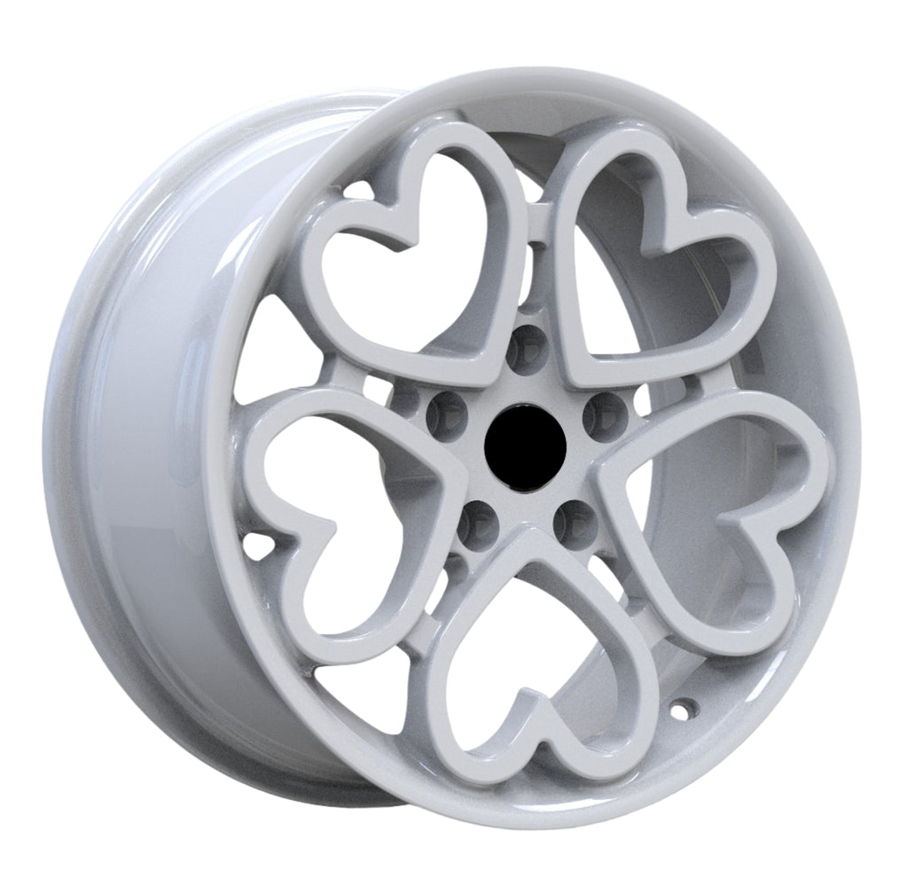 BMW alloy wheel with heart-shaped design on a white background
