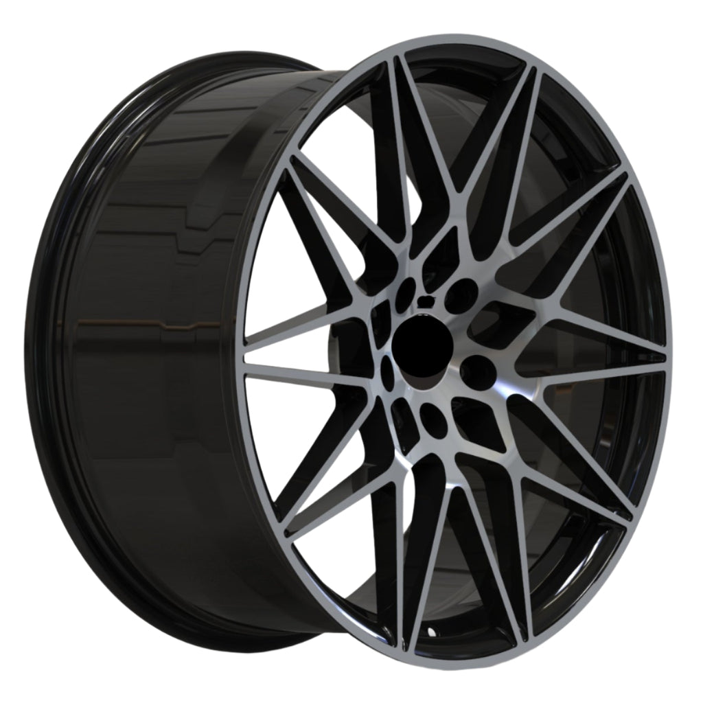 Black BMW alloy wheel on a white background