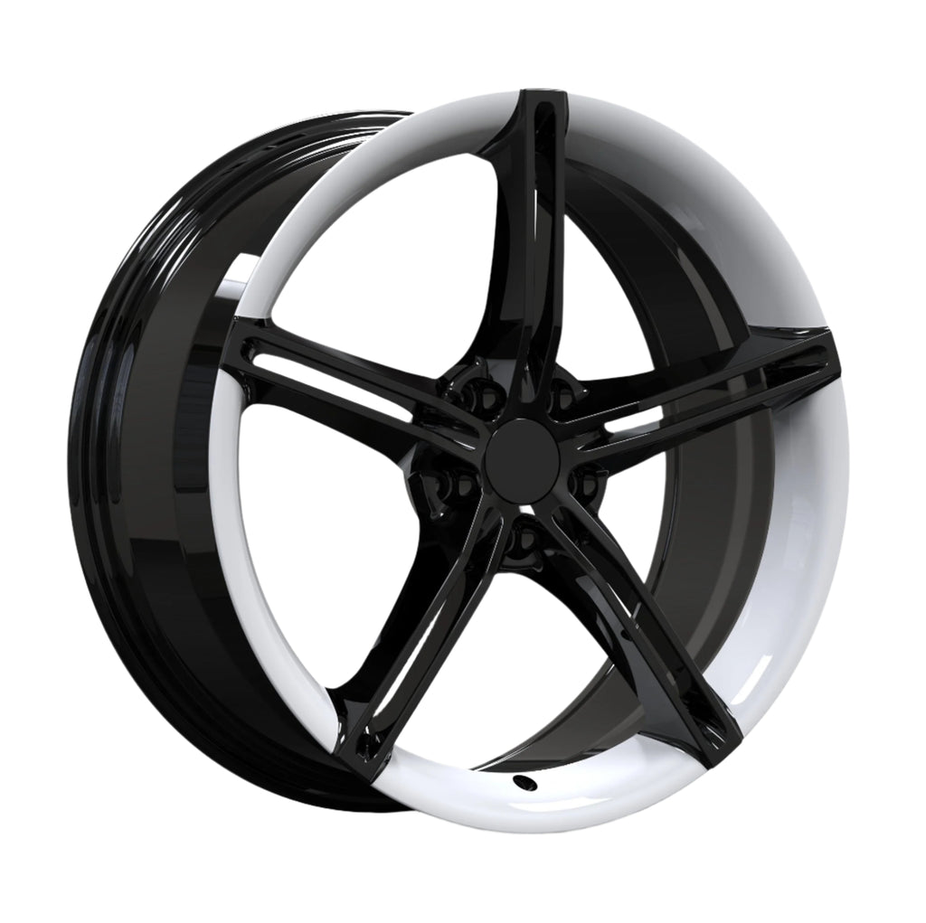 Black alloy wheel on a white background